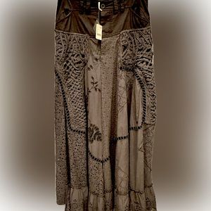 NWT maxi skirt from Free People. More matte purple than black